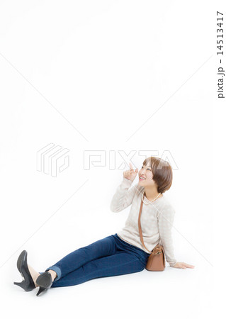 ジーンズ 座るの写真素材