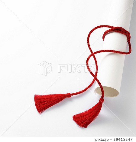 タッセル 赤色 紐 卒業証書の写真素材