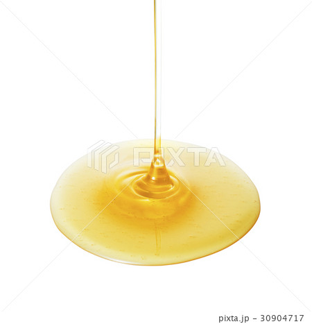 ハチミツ しずる 垂れ 落ちるの写真素材