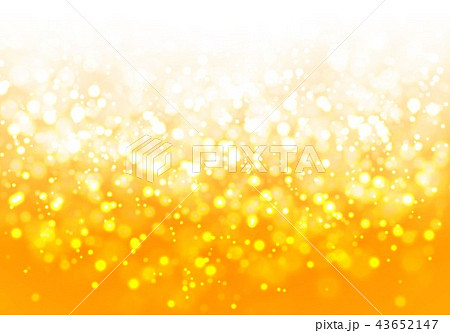 背景 輝き キラキラ 黄色の写真素材