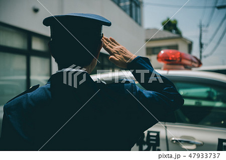 警察官 人物 男性 後ろ姿の写真素材