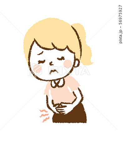 女性 腹痛 お腹 押さえるの写真素材
