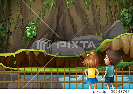 動物園 女の子 柵 檻の写真素材